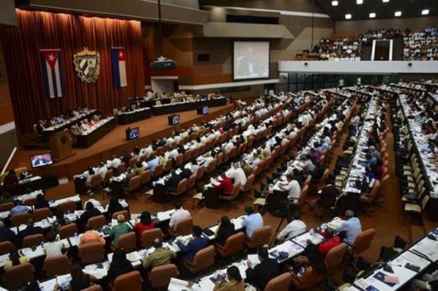 conference auditorium in Cuba filled with persons