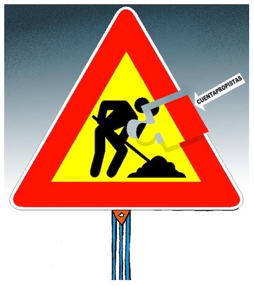 triangular yellow sign with red border set on a post with the image of the Cuban flag, the center of which has a man shoveling with a missing puzzle piece that says "self employed" worker