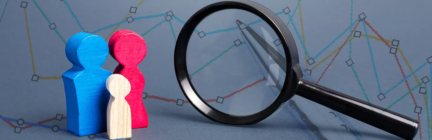 figures representing persons with a magnifying glass in front of demographic data